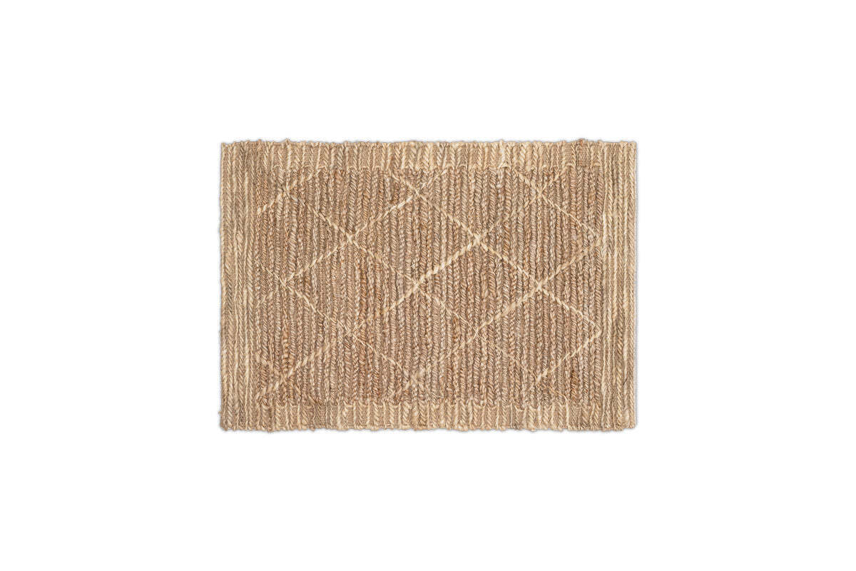 Nkuku Vandi handwoven natural jute doormat with woven diamond design on a white background