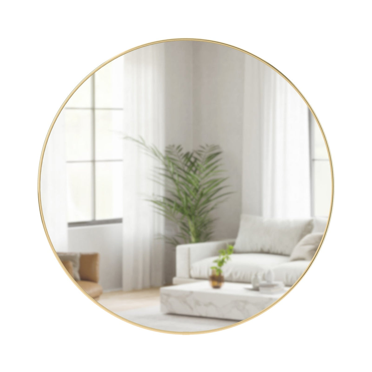 Umbra Hubba 86 cm round wall mirror with brass-finish frame on a white background