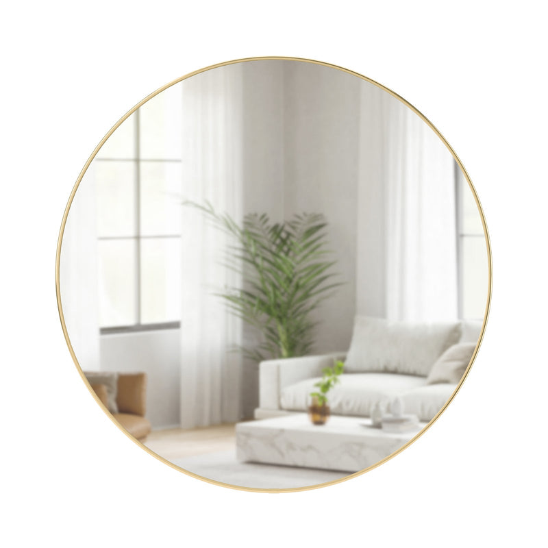 Umbra Hubba 86 cm round wall mirror with brass-finish frame on a white background