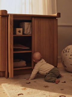 Skye Parchment rug on a wooden floor in a child's room