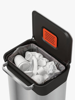 Titan 30L bin open and filled with packaging waste ready to compact