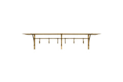 Nkuku Basti antique brass iron storage shelf with six hooks on a white background