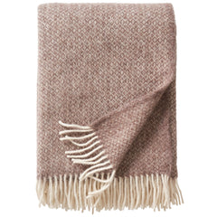 Sand Lima throw folded to show the diamond weave and knotted fringe