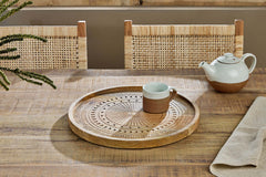 Namuna tray on a dining table with a teapot and mug