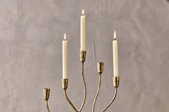 Close view of the Palani candle cups with lit dinner candles