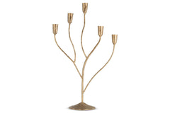 Palani large candelabra in antique brass on a white background