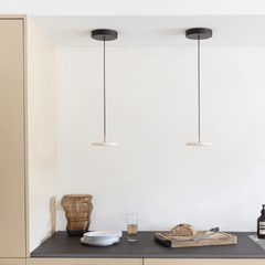 A pair of pearl white Asteria Micro pendants above a kitchen worktop