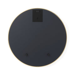Rear view of the Umbra Hubba round mirror showing the brass frame edge and mounting fittings