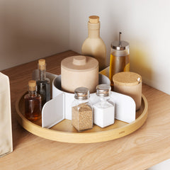 Bellwood lazy Susan holding oils and seasonings on a wooden kitchen worktop