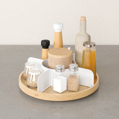 Overhead view of the Bellwood lazy Susan on a grey worktop with its five sections filled