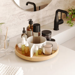 Bellwood rotating organiser used on a bathroom counter for skincare bottles
