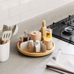 Bellwood turntable beside a hob, organising cooking oils and spice jars