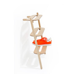 Side view of the oak Heel Bar showing the angled shelves and leaning frame