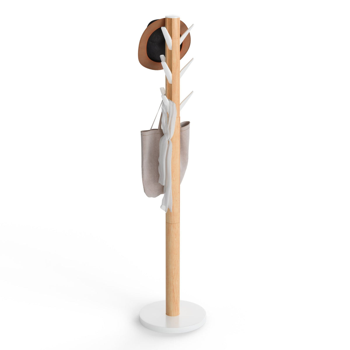 Umbra Flapper freestanding coat rack with natural rubberwood pole and white base on a plain background
