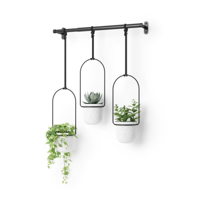 Umbra Triflora set of three white hanging planters on a black extendable rod, on a white background